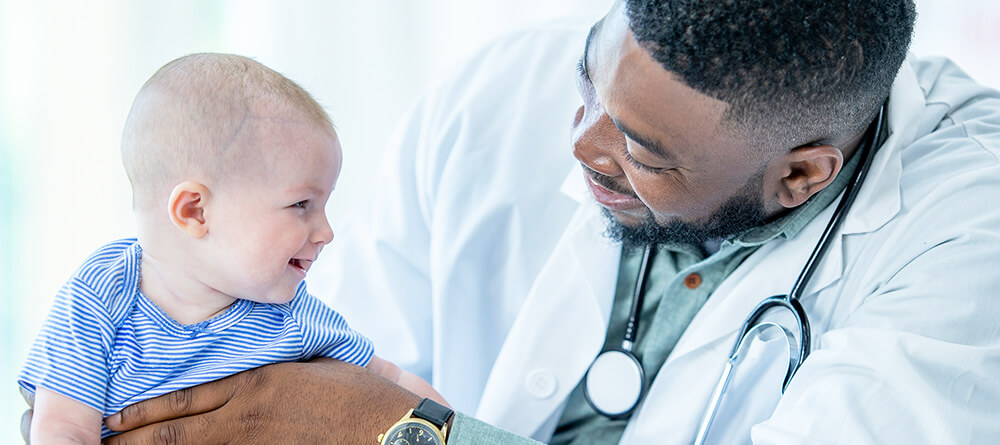 Pediatrician with baby