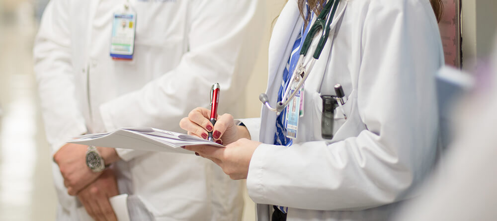 Doctor taking notes